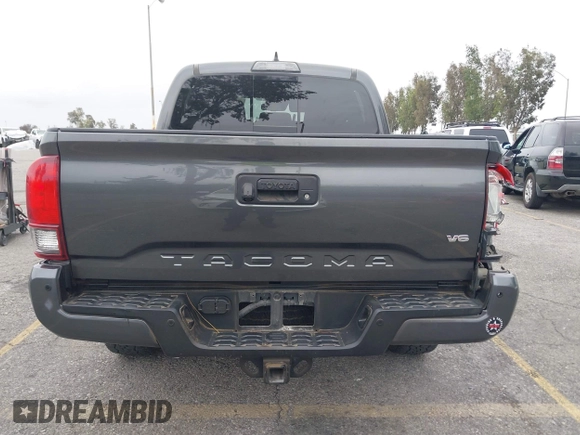2018 Toyota Tacoma SR5 with VIN 3TMAZ5CN1JM071396, listed as a IAAI auction lot 42061640 with 122,148 mi miles and . Bid and sale history available at DreamBid. Image 16.