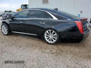 2015 Cadillac XTS Luxury with VIN 2G61M5S35F9225559, listed as a Copart auction lot 55638885 with 130,620 mi miles and Clean title. Bid and sale history available at DreamBid. Image 2.