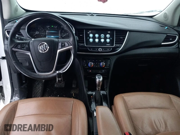 2019 Buick Encore Essence with VIN KL4CJGSM5KB738932, listed as a Copart auction lot 83087444 with 59,162 mi miles and Salvage Title. Bid and sale history available at DreamBid. Image 8.