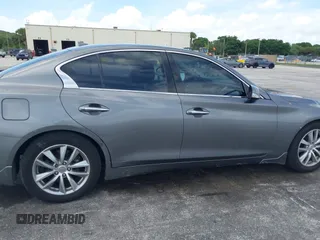 2015 Infiniti Q50 with VIN JN1BV7AP3FM347115, listed as a IAAI auction lot 42787619 with 213,995 mi miles and . Bid and sale history available at DreamBid. Image 13.
