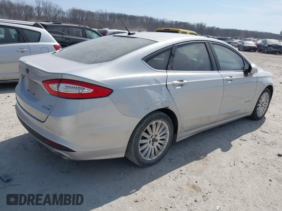 2016 Ford Fusion SE Hybrid with VIN 3FA6P0LU0GR397830, listed as a IAAI auction lot 41785627 with 185,988 mi miles. Bid and sale history available at carsss.com. Image 4.