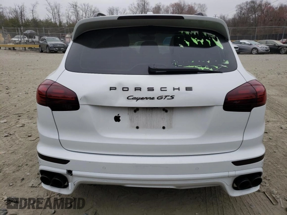 2016 Porsche Cayenne GTS с VIN WP1AD2A26GLA72543, выставлен на аукционе Copart как лот 49081025 с пробегом 160 019 миль миль и Списание • Salvage title. История ставок и продаж доступна на DreamBid. Изображение 6.