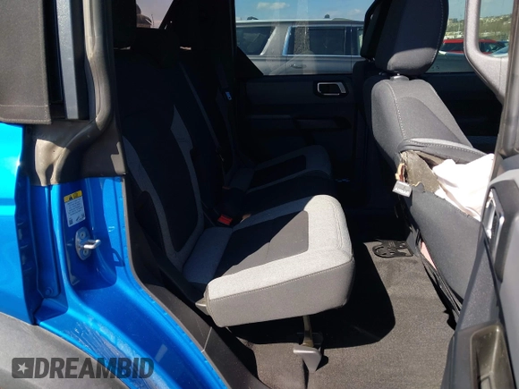 2023 Ford Bronco z VIN 1FMEE5BP1PLA88463, wystawiony jako IAAI lot #41871905 z przebiegiem 36 223 mil mil oraz . Historia ofert i sprzedaży dostępna na DreamBid. Obrazek 8.