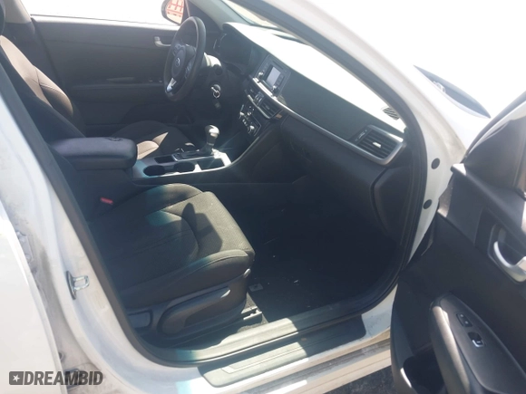 2016 Kia Optima LX with VIN 5XXGT4L37GG043391, listed as a IAAI auction lot 42029630 with 108,511 mi miles. Bid and sale history available at carsss.com. Image 5.