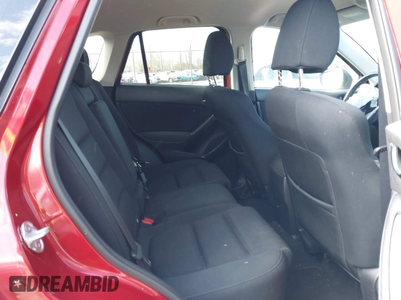 2016 Mazda CX-5 Touring with VIN JM3KE4CY5G0630438, listed as a IAAI auction lot 41877660 with 56,960 mi miles. Bid and sale history available at carsss.com. Image 8.