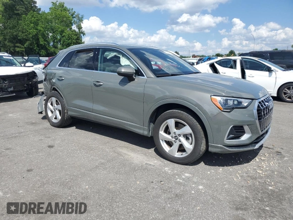 2021 Audi Q3 Premium with VIN WA1AUCF37M1067054, listed as a Copart auction lot 57299815 with 67,334 mi miles and Salvage title. Bid and sale history available at DreamBid. Image 4.