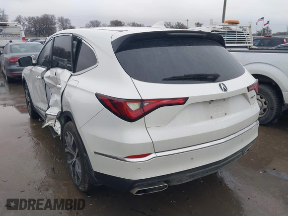 2022 Acura MDX Technology with VIN 5J8YD9H42NL011575, listed as a IAAI auction lot 41459325 with 40,017 mi miles and . Bid and sale history available at DreamBid. Image 3.