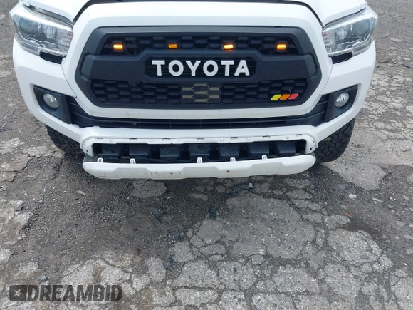 2018 Toyota Tacoma SR with VIN 3TMCZ5AN5JM125066, listed as a IAAI auction lot 41961168 with 88,497 mi miles. Bid and sale history available at carsss.com. Image 6.