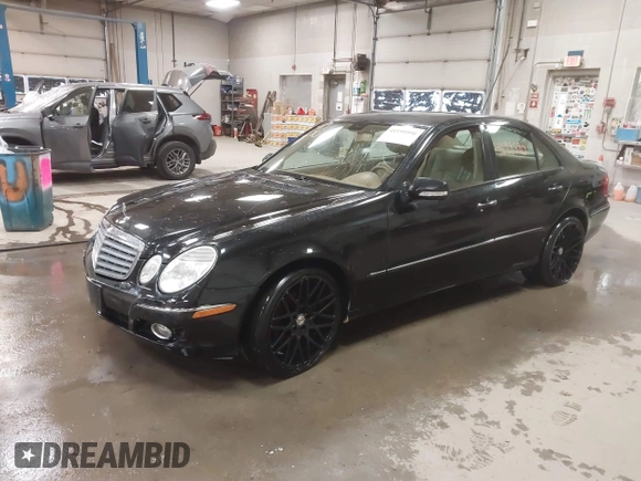 2007 Mercedes-Benz E-Class 3.5L with VIN WDBUF87XX7X214060, listed as a IAAI auction lot 41199590 with 136,011 mi miles. Bid and sale history available at carsss.com. Image 19.