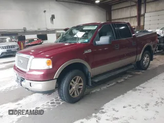 2004 Ford F-150 XLT with VIN 1FTPW14564KD79671, listed as a IAAI auction lot 42166489 with 205,083 mi miles. Bid and sale history available at carsss.com. Image 2.