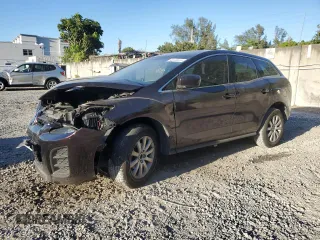 2010 Mazda CX-7 Sport z VIN JM3ER2W57A0309788, wystawiony jako Copart lot #48125575 z przebiegiem 199 323 mil mil oraz Szkoda całkowita • Salvage title. Historia ofert i sprzedaży dostępna na DreamBid. Obrazek 1.