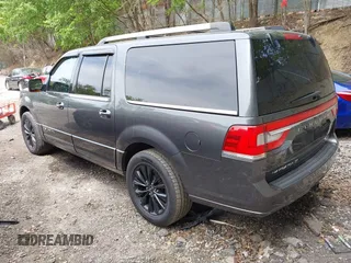 2015 Lincoln Navigator z VIN 5LMJJ3JT3FEJ07172, wystawiony jako IAAI lot #42313343 z przebiegiem 189 807 mil mil oraz . Historia ofert i sprzedaży dostępna na DreamBid. Obrazek 3.