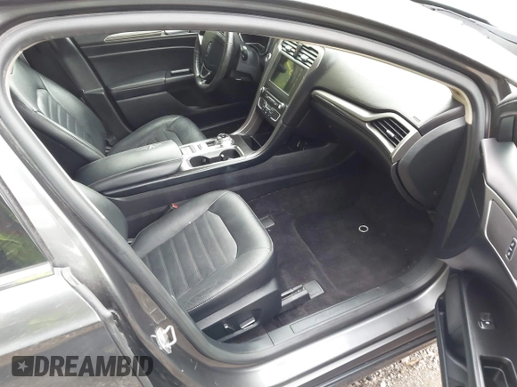 2017 Ford Fusion SE with VIN 3FA6P0HD3HR335350, listed as a IAAI auction lot 42201095 with 165,101 mi miles and . Bid and sale history available at DreamBid. Image 5.