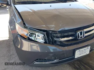 2015 Honda Odyssey EX-L z VIN 5FNRL5H68FB025338, wystawiony jako IAAI lot #41760096 z przebiegiem 181 252 mil mil oraz . Historia ofert i sprzedaży dostępna na DreamBid. Obrazek 6.