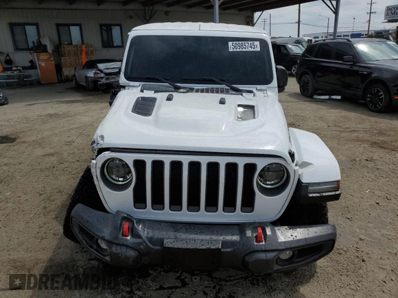 2023 Jeep Wrangler Rubicon with VIN 1C4HJXFG3PW691724, listed as a Copart auction lot 50985745 with 32,377 mi miles and Salvage title. Bid and sale history available at DreamBid. Image 5.