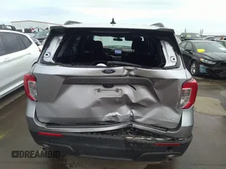 2022 Ford Explorer XLT z VIN 1FMSK8DH7NGB83988, wystawiony jako IAAI lot #41351547 z przebiegiem 60 668 mil mil oraz . Historia ofert i sprzedaży dostępna na DreamBid. Obrazek 6.