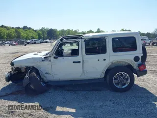 2019 Jeep Wrangler Unlimited Sahara with VIN 1C4HJXEN5KW509806, listed as a IAAI auction lot 42071325 with 95,549 mi miles and . Bid and sale history available at DreamBid. Image 15.