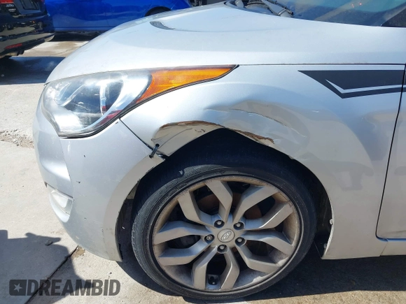 2013 Hyundai Veloster w/Black Int z VIN KMHTC6AD3DU092305, wystawiony jako IAAI lot #41721717 z przebiegiem 158 534 mil mil oraz . Historia ofert i sprzedaży dostępna na DreamBid. Obrazek 12.