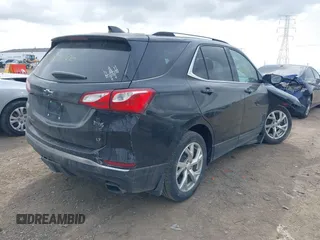 2018 Chevrolet Equinox LT with VIN 2GNAXKEXXJ6213183, listed as a IAAI auction lot 41878206 with 140,000 mi miles and . Bid and sale history available at DreamBid. Image 4.