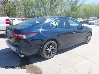 2021 Toyota Camry SE Nightshade with VIN 4T1G11AK3MU462290, listed as a IAAI auction lot 42033207 with 111,163 mi miles and . Bid and sale history available at DreamBid. Image 4.