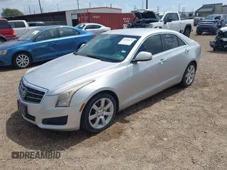 2014 Cadillac ATS Standard RWD with VIN 1G6AA5RA1E0104839, listed as a IAAI auction lot 42383432 with 142,701 mi miles and . Bid and sale history available at DreamBid. Image 2.