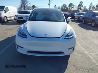 2023 Tesla Model Y Long Range with VIN 7SAYGDEE5PA094253, listed as a IAAI auction lot 41701966 with 29,458 mi miles and . Bid and sale history available at DreamBid. Image 12.
