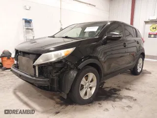 2013 Kia Sportage LX with VIN KNDPB3A22D7441703, listed as a IAAI auction lot 41420552 with 176,619 mi miles. Bid and sale history available at carsss.com. Image 2.