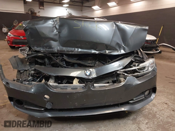 2014 BMW 4 Series 428i xDrive with VIN WBA3T1C59EPS98299, listed as a IAAI auction lot 41741235 with 93,000 mi miles and . Bid and sale history available at carsss.com. Image 6.