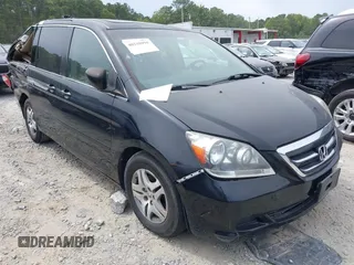 2006 Honda Odyssey EX-L z VIN 5FNRL38716B448565, wystawiony jako IAAI lot #40228950 z przebiegiem 210 035 mil mil oraz . Historia ofert i sprzedaży dostępna na DreamBid. Obrazek 1.