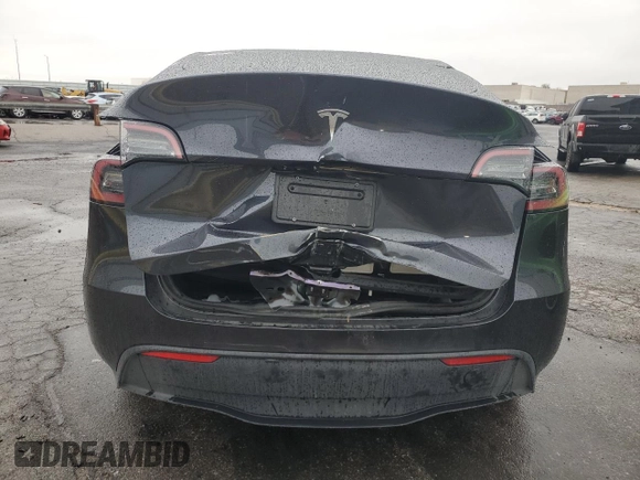 2024 Tesla Model Y z VIN 7SAYGDED4RF125330, wystawiony jako Copart lot #81385224 z przebiegiem 3 631 mil mil oraz Szkoda całkowita • Salvage title. Historia ofert i sprzedaży dostępna na DreamBid. Obrazek 6.