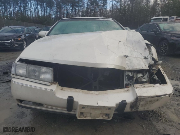 1997 Cadillac Seville Touring STS with VIN 1G6KY5292VU818343, listed as a Copart auction lot 86368564 with 0 mi miles and Non Repairable. Bid and sale history available at carsss.com. Image 5.