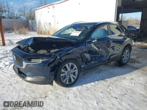 2022 Mazda CX-30 S Select with VIN 3MVDMBBL9NM448264, listed as a IAAI auction lot 41294686 with 9,324 mi miles and . Bid and sale history available at DreamBid. Image 2.