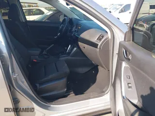 2013 Mazda CX-5 Touring with VIN JM3KE2CE3D0123138, listed as a IAAI auction lot 41818678 with 173,909 mi miles. Bid and sale history available at carsss.com. Image 5.