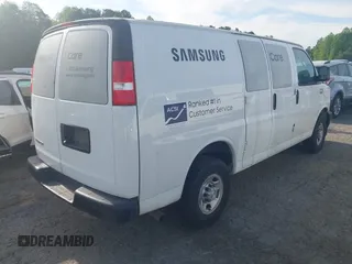 2019 Chevrolet Express Cargo Van with VIN 1GCWGAFP0K1170744, listed as a IAAI auction lot 42076354 with 218,813 mi miles. Bid and sale history available at carsss.com. Image 4.