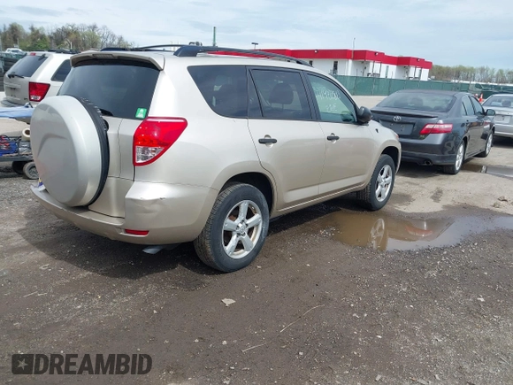 2006 Toyota RAV4 with VIN JTMZK33V365000984, listed as a IAAI auction lot 41957813 with 121,527 mi miles. Bid and sale history available at carsss.com. Image 4.