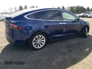 2017 Tesla Model X 90D z VIN 5YJXCDE22HF040293, wystawiony jako Copart lot #48324025 z przebiegiem 53 515 mil mil oraz Szkody całkowita. Historia ofert i sprzedaży dostępna na DreamBid. Obrazek 3.