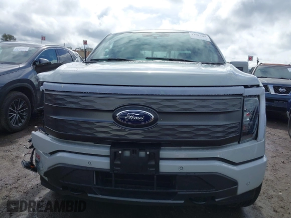 2023 Ford F-150 Lightning Pro with VIN 1FTVW1EV3PWG60491, listed as a IAAI auction lot 41507485 with 19,148 mi miles and . Bid and sale history available at DreamBid. Image 13.