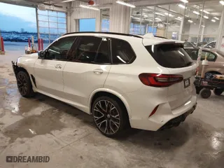 2023 BMW X5 M with VIN 5YMJU0C04P9N91130, listed as a IAAI auction lot 41218261 with 1 mi miles. Bid and sale history available at carsss.com. Image 3.