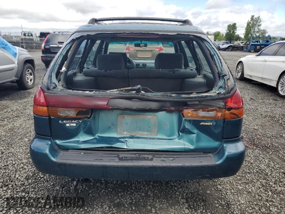 1998 Subaru Legacy L with VIN 4S3BK4358W6309643, listed as a Copart auction lot 57589795 with 250,739 mi miles and Salvage title. Bid and sale history available at DreamBid. Image 6.