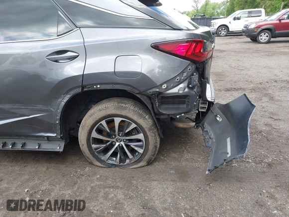 2022 Lexus RX 350 z VIN 2T2HZMDA8NC313731, wystawiony jako IAAI lot #42190259 z przebiegiem 144 177 mil mil oraz . Historia ofert i sprzedaży dostępna na DreamBid. Obrazek 6.