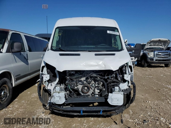 2024 Ford Transit Cargo with VIN 1FTBR1C82RKA03876, listed as a Copart auction lot 84399854 with 8,073 mi miles and Salvage Title. Bid and sale history available at DreamBid. Image 5.