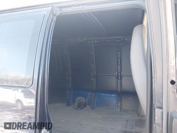 2014 Chevrolet Express Cargo Van with VIN 1GCWGGBA5E1205786, listed as a IAAI auction lot 41339085 with 201,460 mi miles. Bid and sale history available at carsss.com. Image 8.