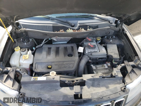 2016 Jeep Compass Sport with VIN 1C4NJDBB1GD521904, listed as a Copart auction lot 65169062 with 125,228 mi miles. Bid and sale history available at carsss.com. Image 7.