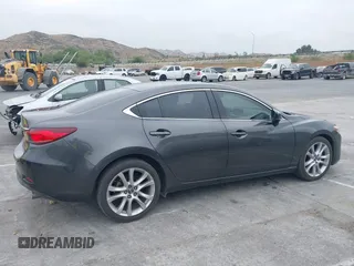 2017 Mazda Mazda6 Touring with VIN JM1GL1V51H1137065, listed as a IAAI auction lot 42078517 with 81,457 mi miles. Bid and sale history available at carsss.com. Image 13.
