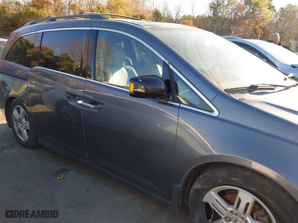 2013 Honda Odyssey Touring with VIN 5FNRL5H9XDB009973, listed as a IAAI auction lot 41904710 with 219,067 mi miles. Bid and sale history available at carsss.com. Image 13.