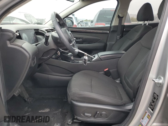 2022 Hyundai Tucson SEL z VIN 5NMJFCAE5NH147033, wystawiony jako Copart lot #50194695 z przebiegiem 30 178 mil mil oraz Szkoda całkowita • Salvage title. Historia ofert i sprzedaży dostępna na DreamBid. Obrazek 7.