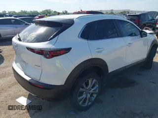 2023 Mazda CX-30 S Carbon Edition with VIN 3MVDMBCM2PM552282, listed as a IAAI auction lot 42241909 with 14,765 mi miles and . Bid and sale history available at DreamBid. Image 4.