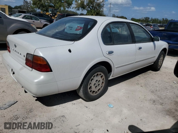 1995 Nissan Maxima GLE с VIN JN1CA21D6ST059369, выставлен на аукционе Copart как лот 74794884 с пробегом 246 806 миль миль и Списание • Salvage title. История ставок и продаж доступна на DreamBid. Изображение 3.