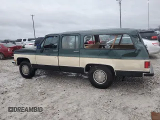 1990 GMC Suburban z VIN 1GKGR26K8LF528125, wystawiony jako Copart lot #84931724 z przebiegiem Nie podano mil oraz Szkody całkowita. Historia ofert i sprzedaży dostępna na DreamBid. Obrazek 2.