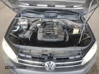 2013 Volkswagen Touareg Lux с VIN WVGEF9BP9DD003735, выставлен на аукционе Copart как лот 58852315 с пробегом 138 223 миль миль и Списание • Salvage title. История ставок и продаж доступна на DreamBid. Изображение 11.